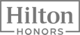 The image shows the Hilton Honors logo, with "Hilton" in large text above "Honors" in smaller text, enclosed in a rectangular frame.